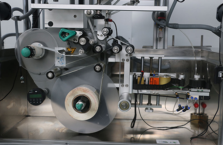 果脯盒上下面貼標機